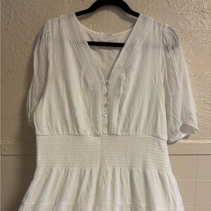 Elegant White Dress with Button Detail